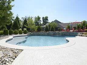 private paradise pool with rockscaping and lounge areas