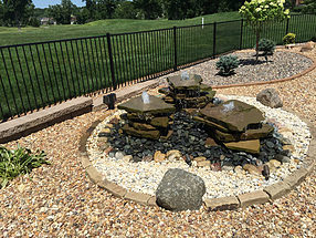 landscape design, hardscape, st. louis landscape, water feature, fountain, flagstone, beach pebbles, granite