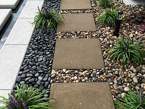 landscape design, hardscape, st. louis landscape, stepping stones, pathway, beach pebbles, gravel