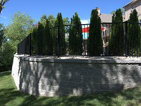 landscape design, hardscape, st. louis landscape, retaining wall, fence, evergreens