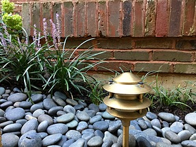 landscape design, lighting, st. louis landscape, bronze, liriope, beach pebbles