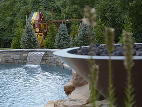 landscape design, lighting, st. louis landscape, evergreen, pool, fire bowl