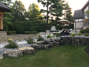 landscape design, hardscape, st. louis landscape, limestone retaining wall, butterfly bush, coreopsis